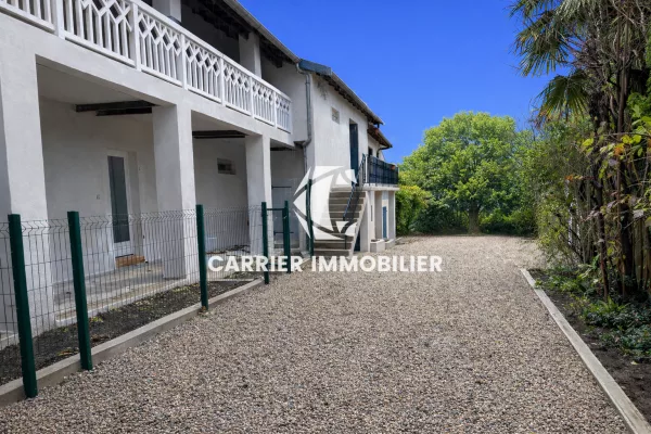 Genay - Appartement T4 de 72 m2 avec terrain non attenant de